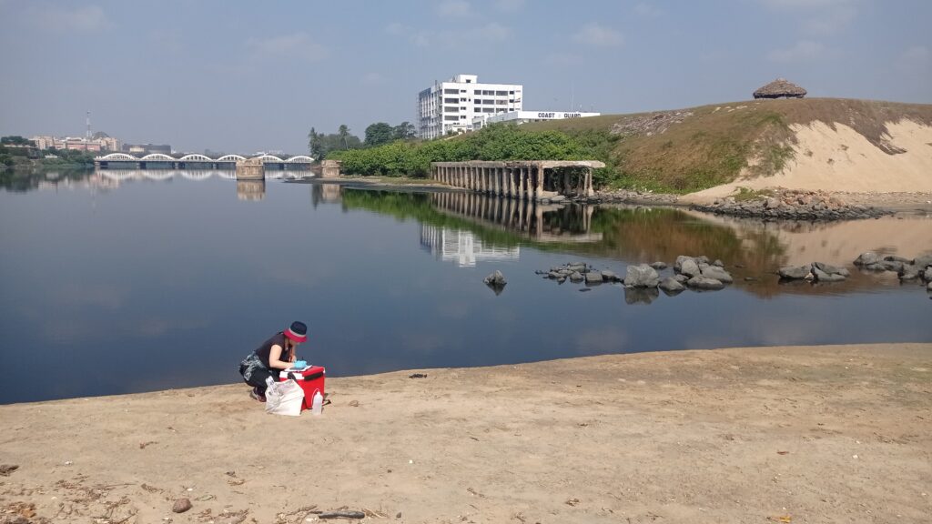 Fieldwork Adyar: Taking sediment and water samples at the river mouth of Adyar River. Picture taken by Dr. Daniel Rosado.